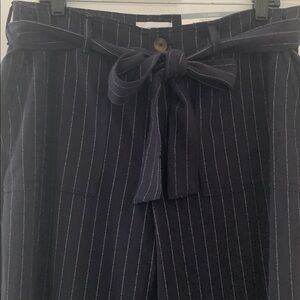Navy pinstripe trousers NWT size 12 with matching belt.